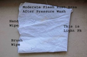 A direct comparison between hand wipe and brush test on pressure washed moderate flash rust indicates no differences.